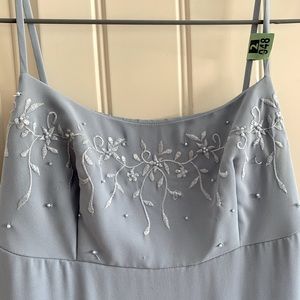 Powder blue bridesmaid/graduation full-length young girl’s gown.